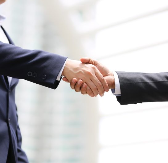 Business people hand shaking